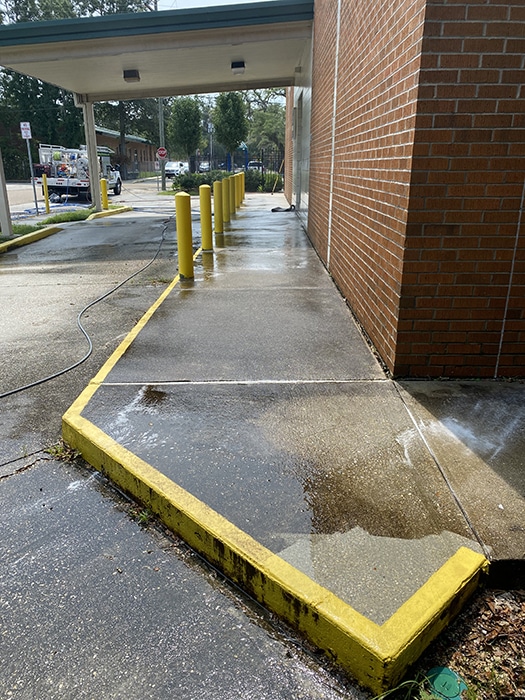 Parking lot before pressure washing